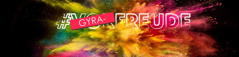 Farbenfroher Hintergrund mit Farbexplosionen in verschiedenen Tönen. Im Vordergrund steht der Text "#GYRA-FREUDE" in leuchtenden Buchstaben, wobei das Wort "GYRA" durch eine pinkfarbene Schrift hervorgehoben ist.
